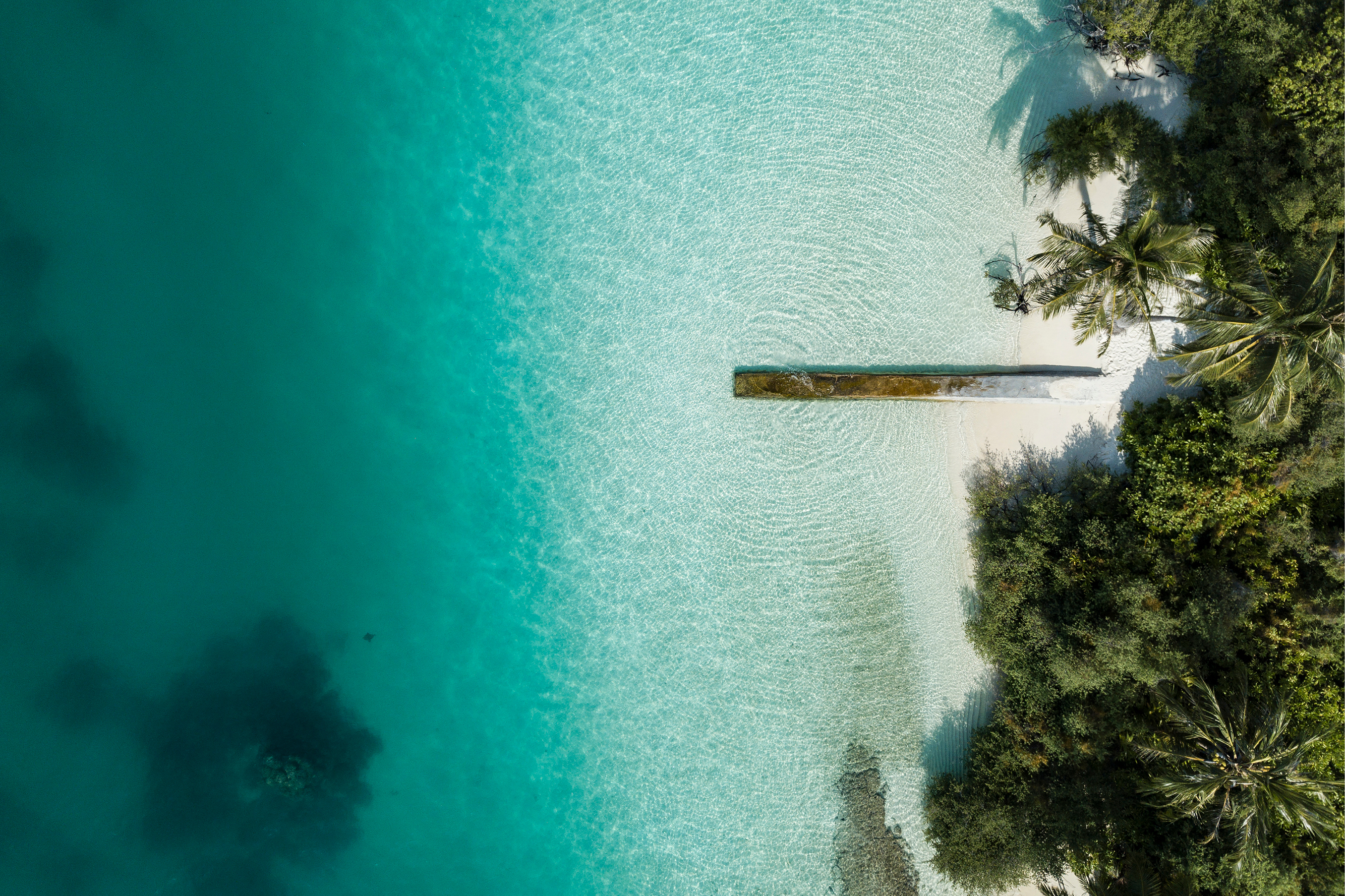 Maldives — overwater jetty, aerial